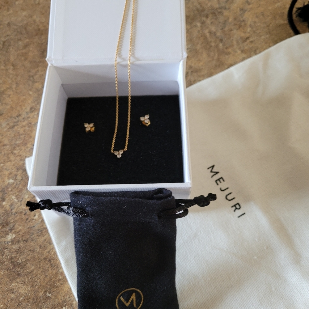 Mejuri gold vermeil lotus earrings and necklace